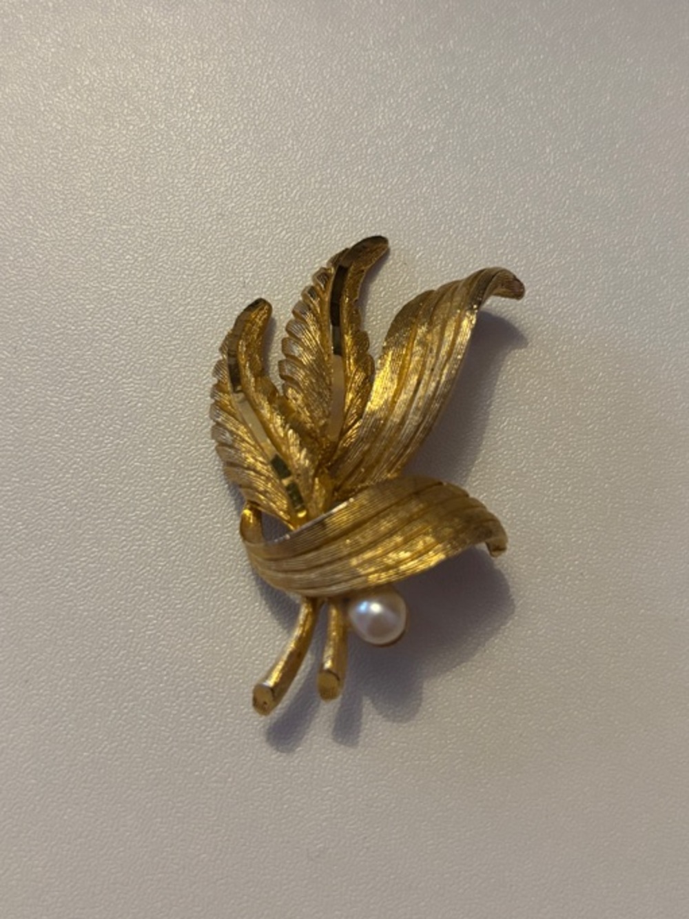 Vintage BSK Gold Tone Leaf Brooch with Faux Pearl Accent